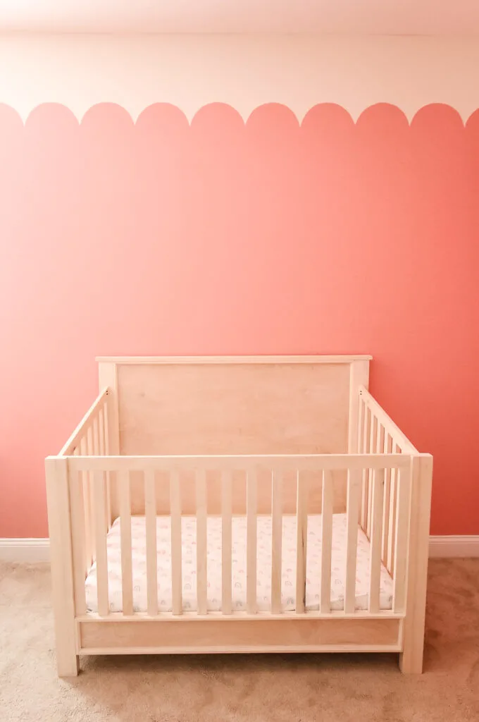 Full view of DIY crib with scallop wall