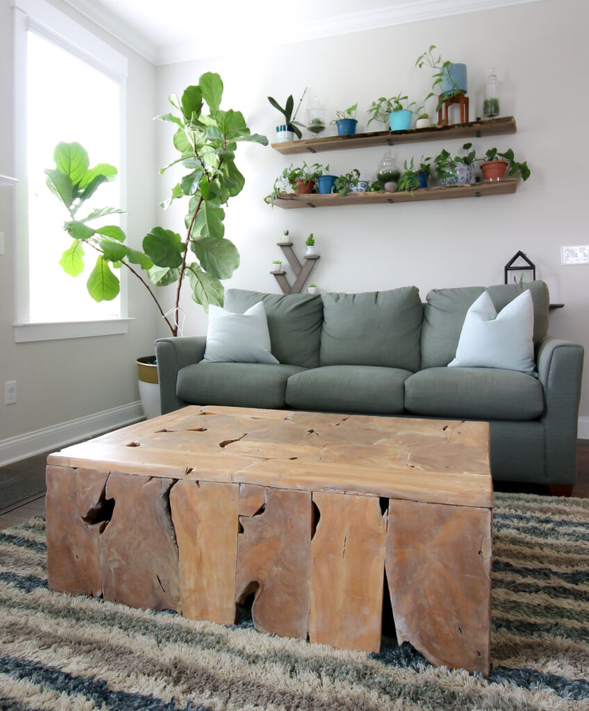 thrifted wood slice coffee table after makeover