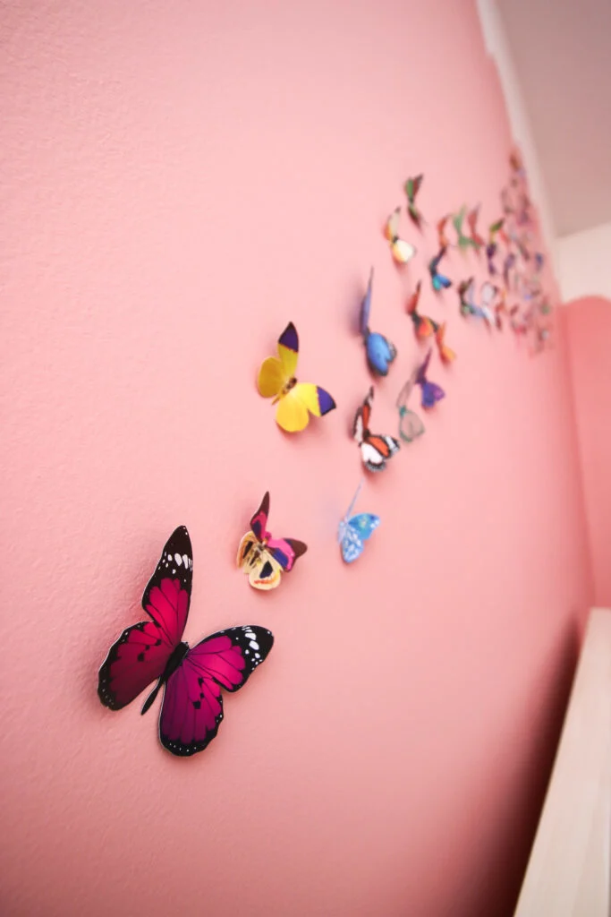 butterflies hanging on a wall