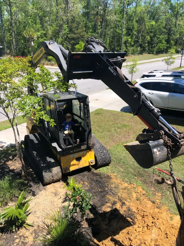 Luke driving the excavator