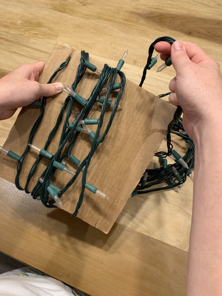 wrap lights around cardboard