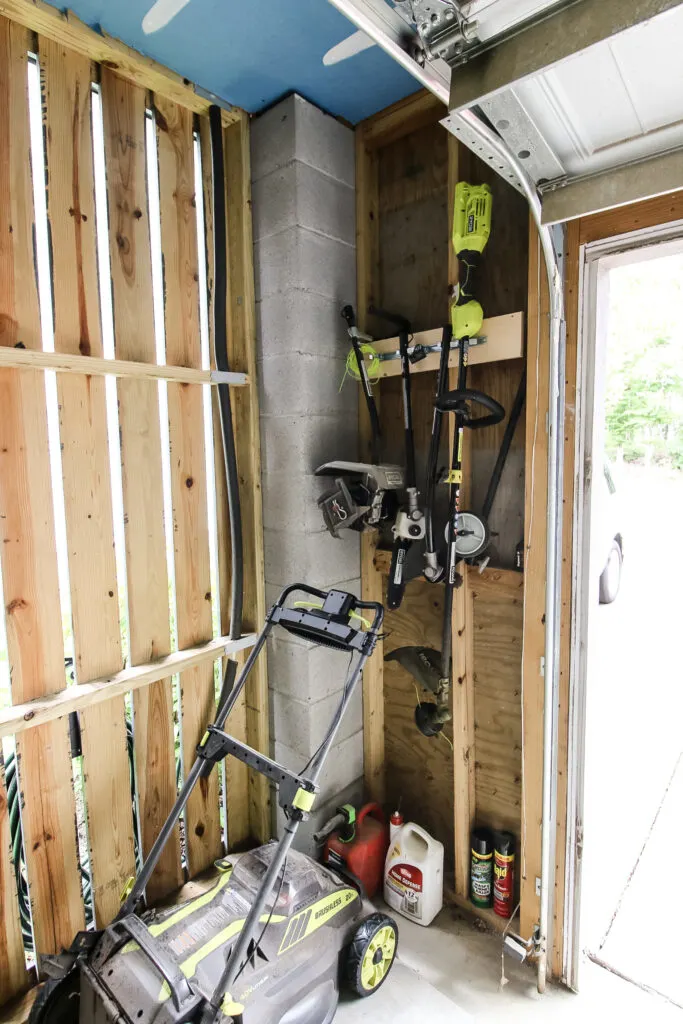 Outdoor power tools hanging in garage