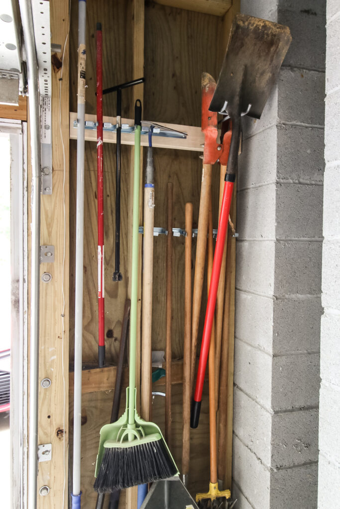 Hanging tools next to garage door