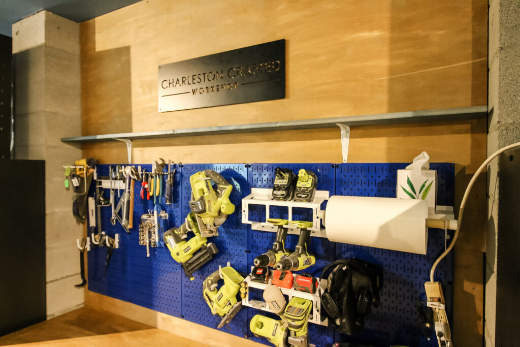 Tools hanging on Wall Control panels in workshop