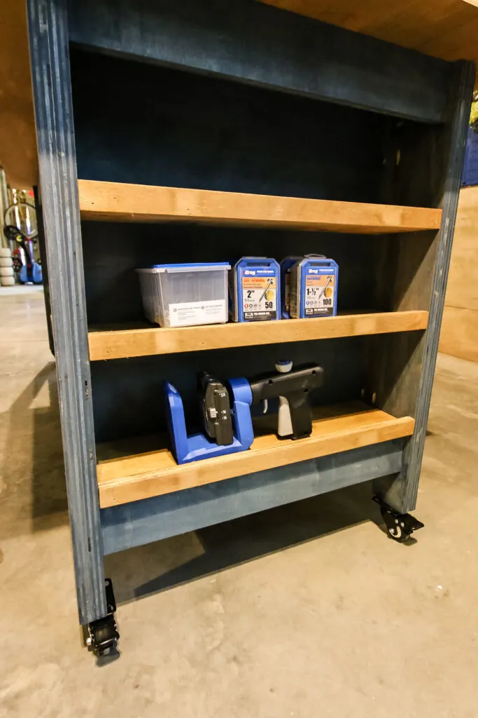 Shelving on mobile plywood workbench