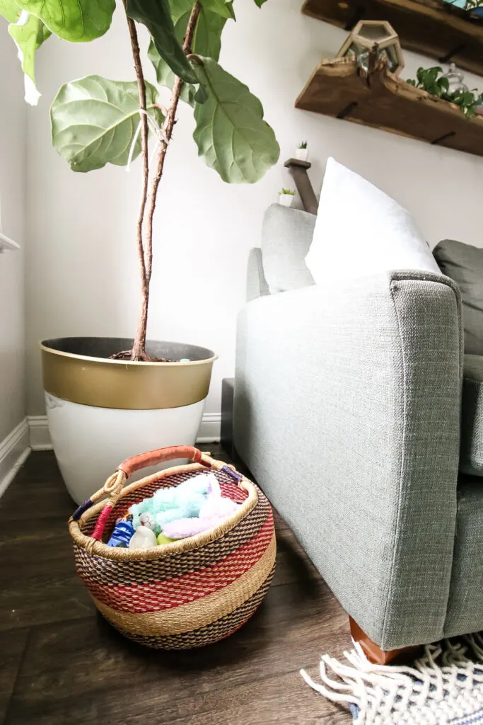 store toys in a basket in living room