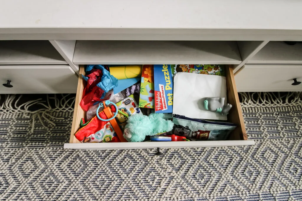 store toys in drawer in living room