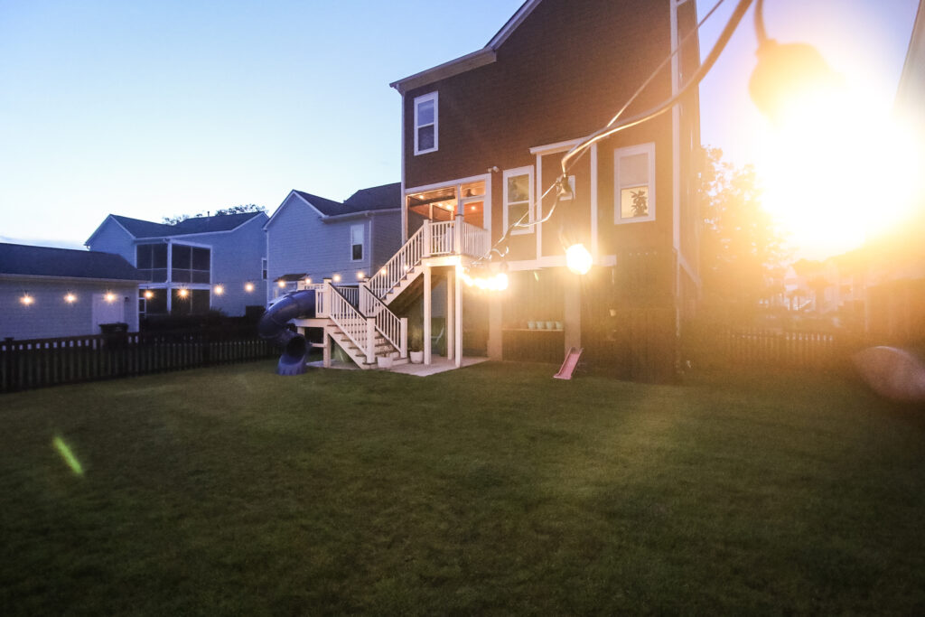 Bistro lights hanging in the backyard