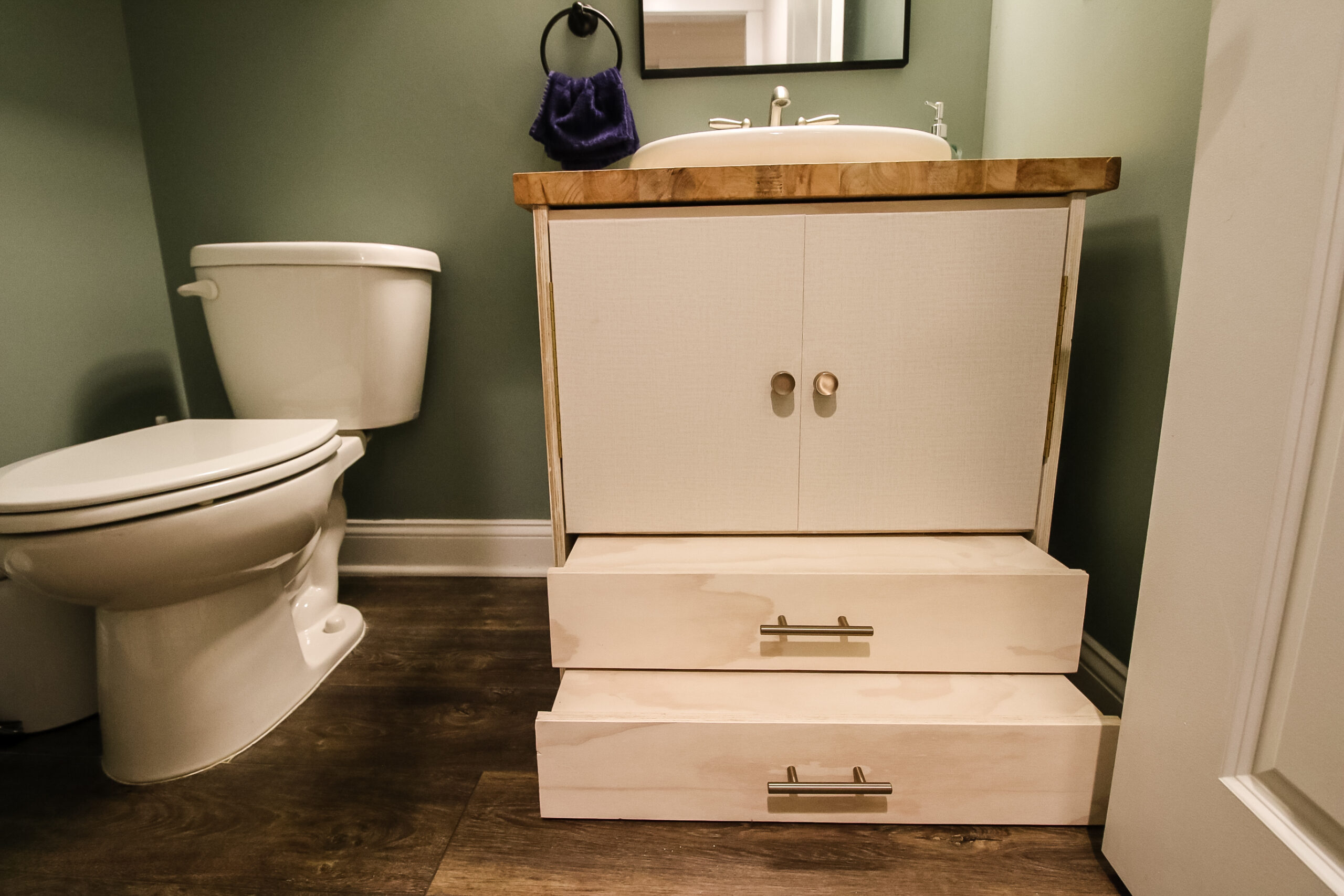 How to turn a bathroom pedestal sink into a vanity with a cabinet. 