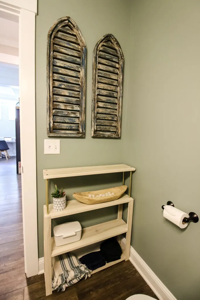 shelving and shutters in half bathroom