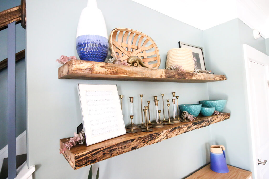 Live edge floating shelves on wall