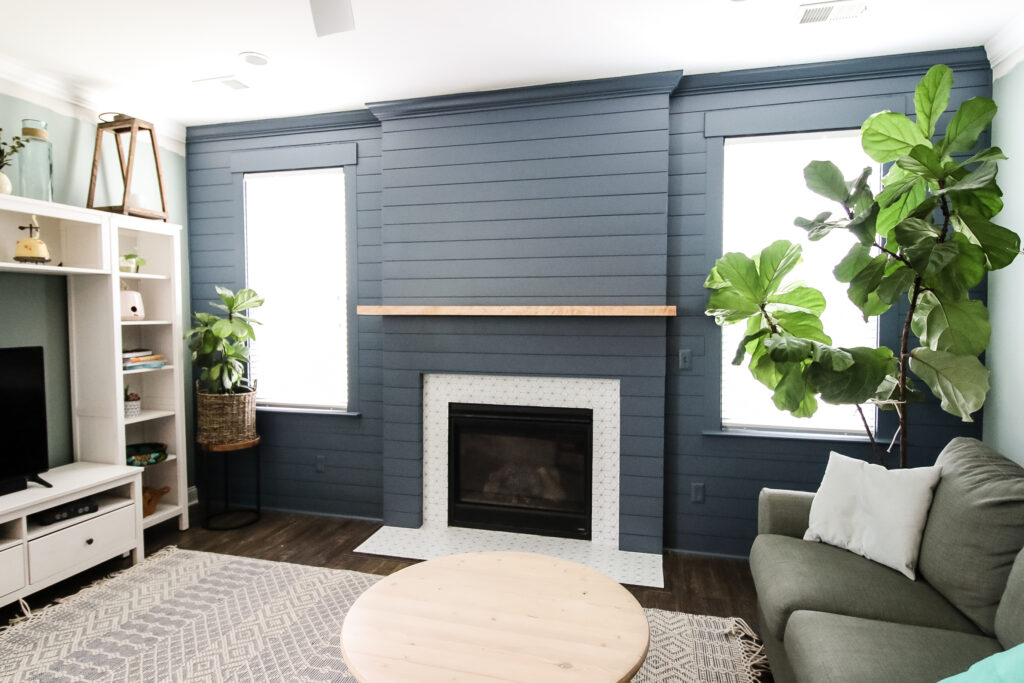 Full picture of shiplap fireplace and accent wall