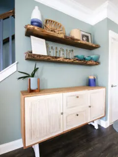 Live edge shelves above buffet table