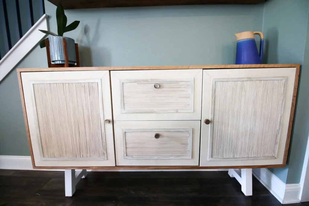 Straight on picture of DIY buffet table with fluted doors