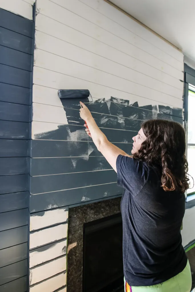 Painting shiplap boards with roller
