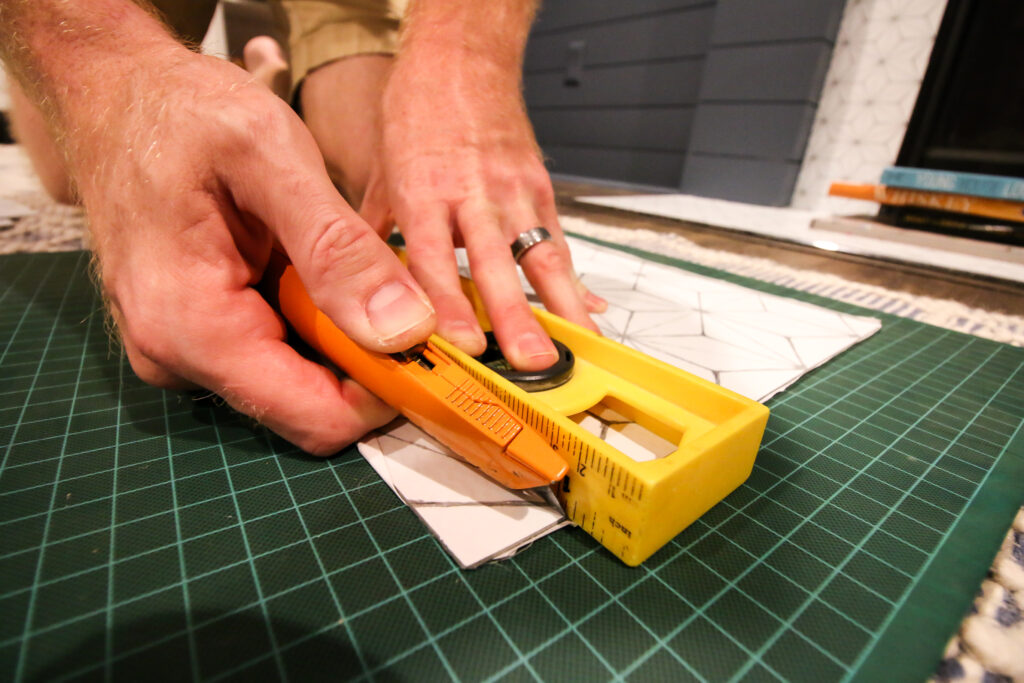cutting peel and stick tile with a straight edge