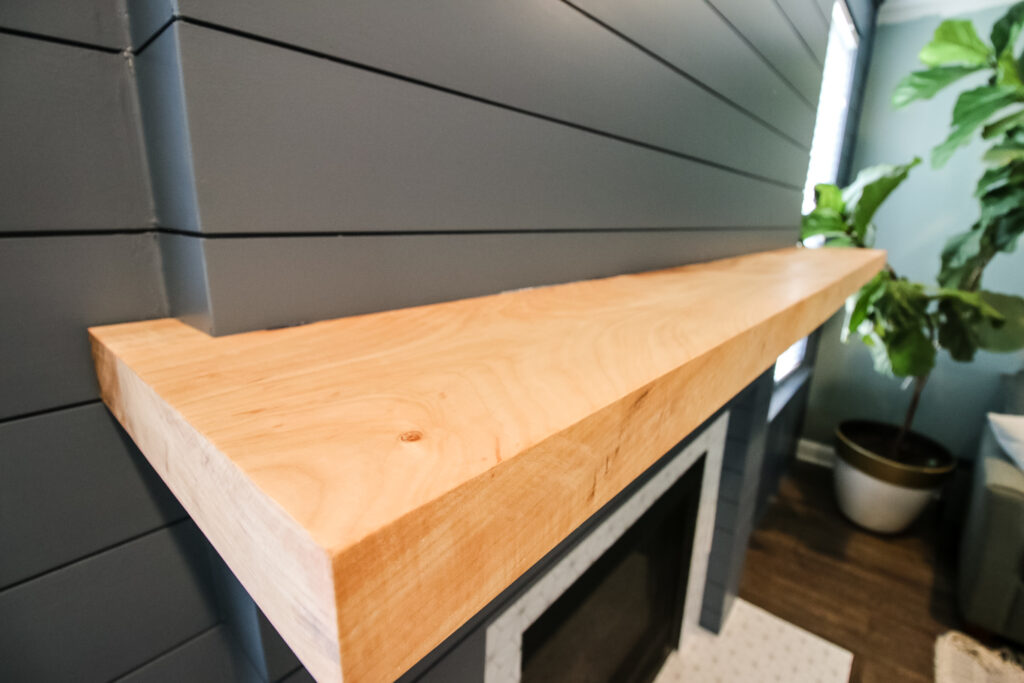 Close up picture of curly maple mantel