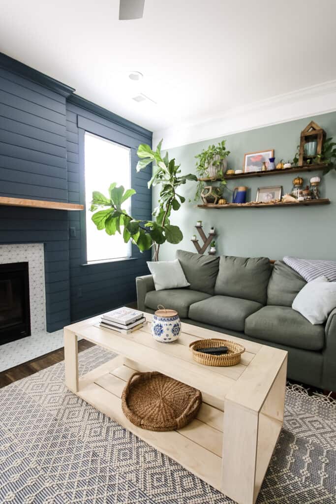 Coffee table with shiplap fireplace