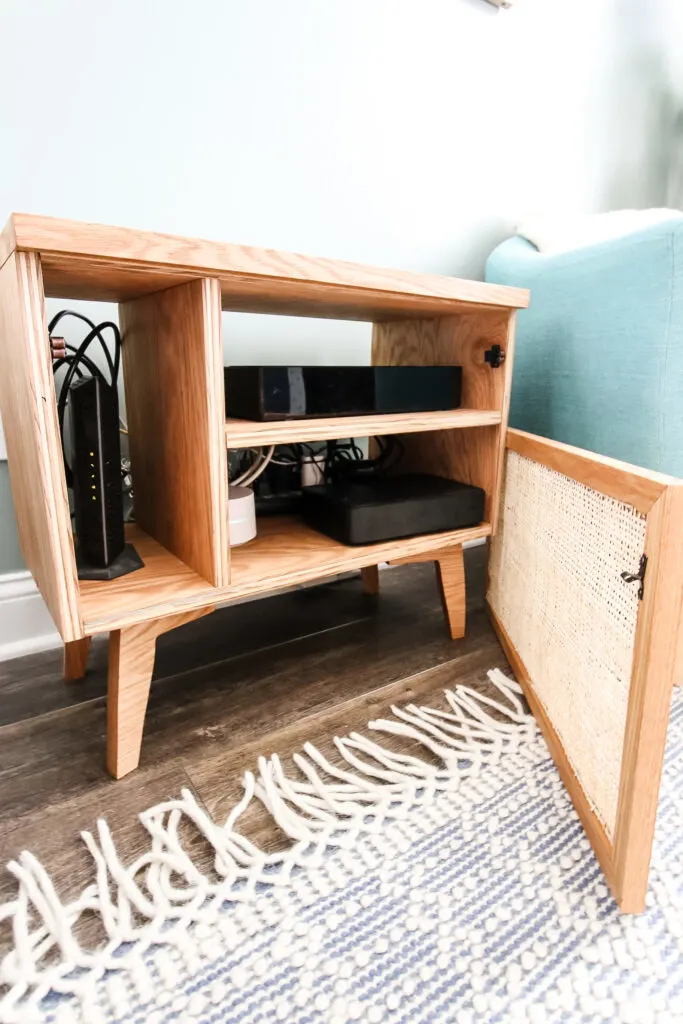 Door open on side table to TV accessories