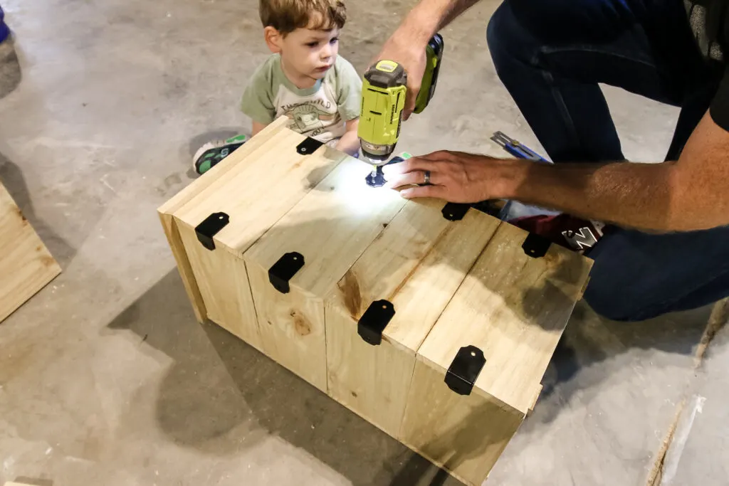 Attaching decorative hardware to DIY planter box