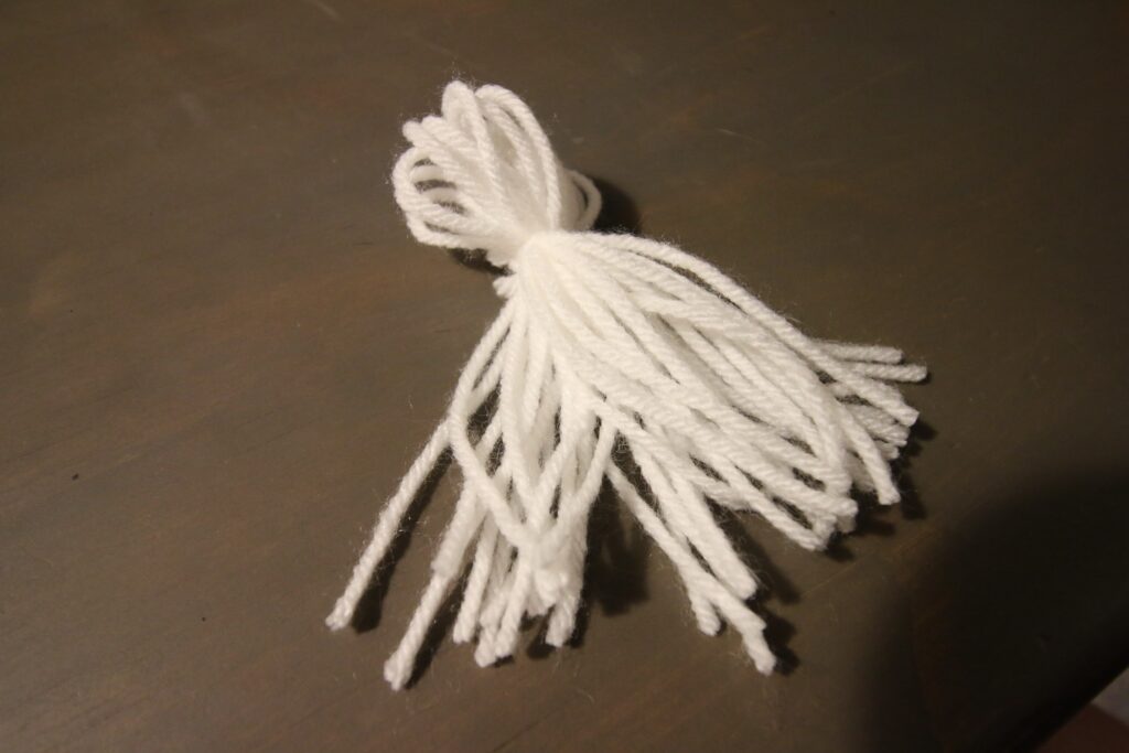 how to make a yarn ghost tassel