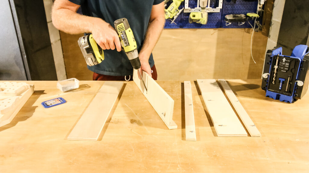 Assembling tiered spice drawer organizer
