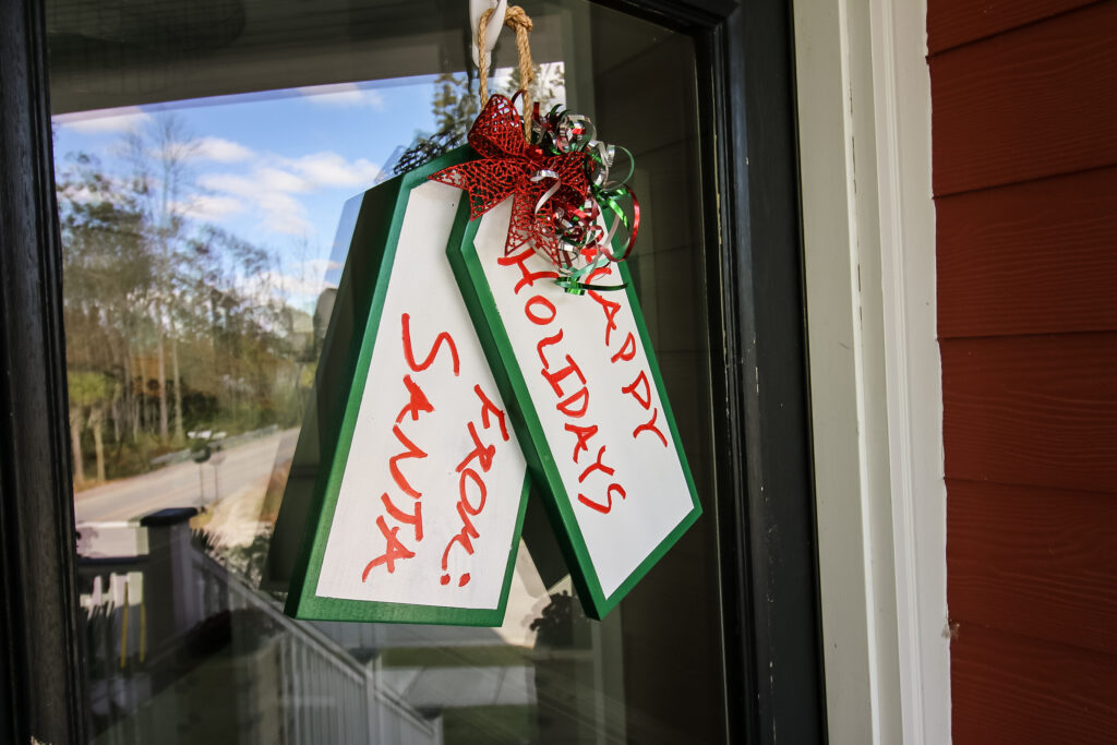 Gift tag door hanger on front door