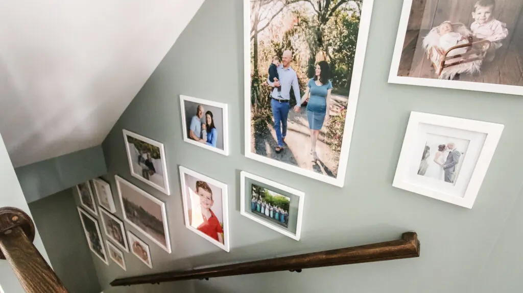 Wide photo of staircase gallery wall