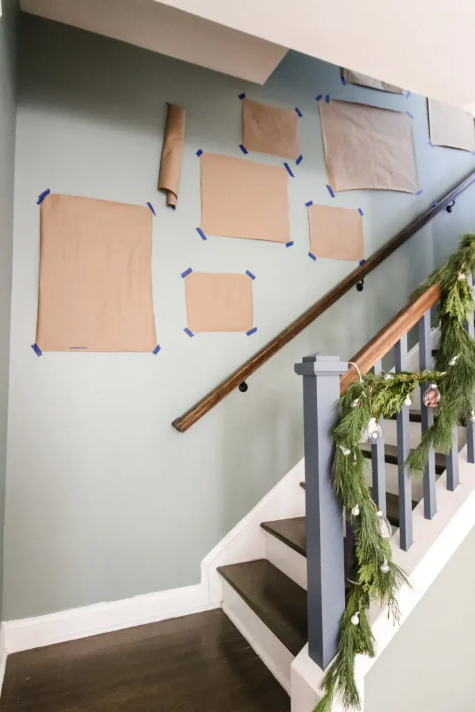 Determine layout of staircase gallery wall with paper templates