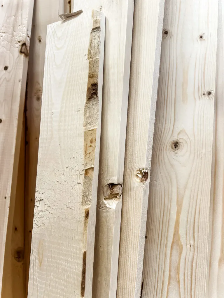 Knots in white wood at hardware store