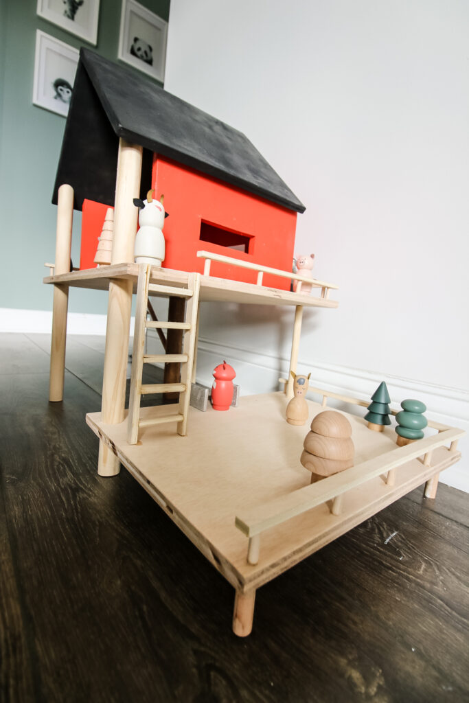 Side view of DIY wooden toy treehouse