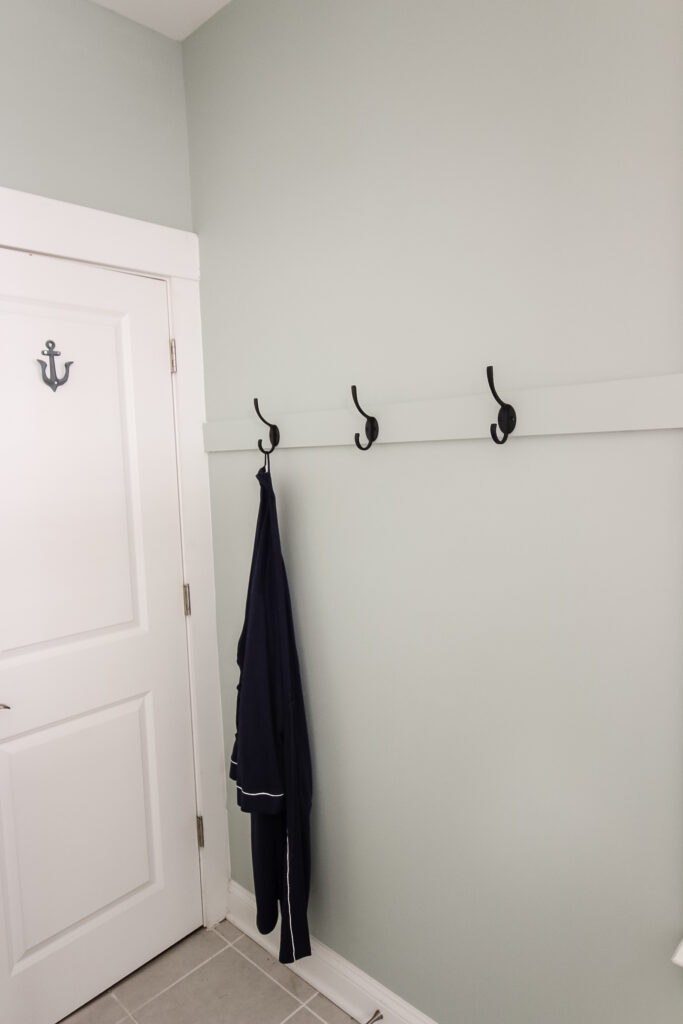 Hook rail installed in bathroom