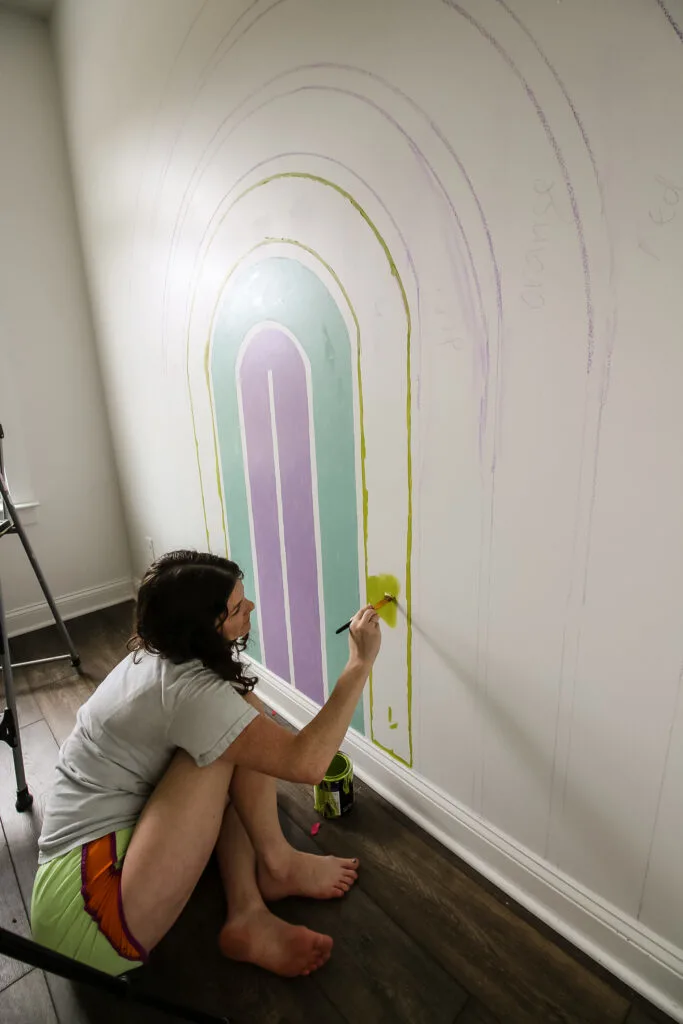 painting a rainbow wall mural