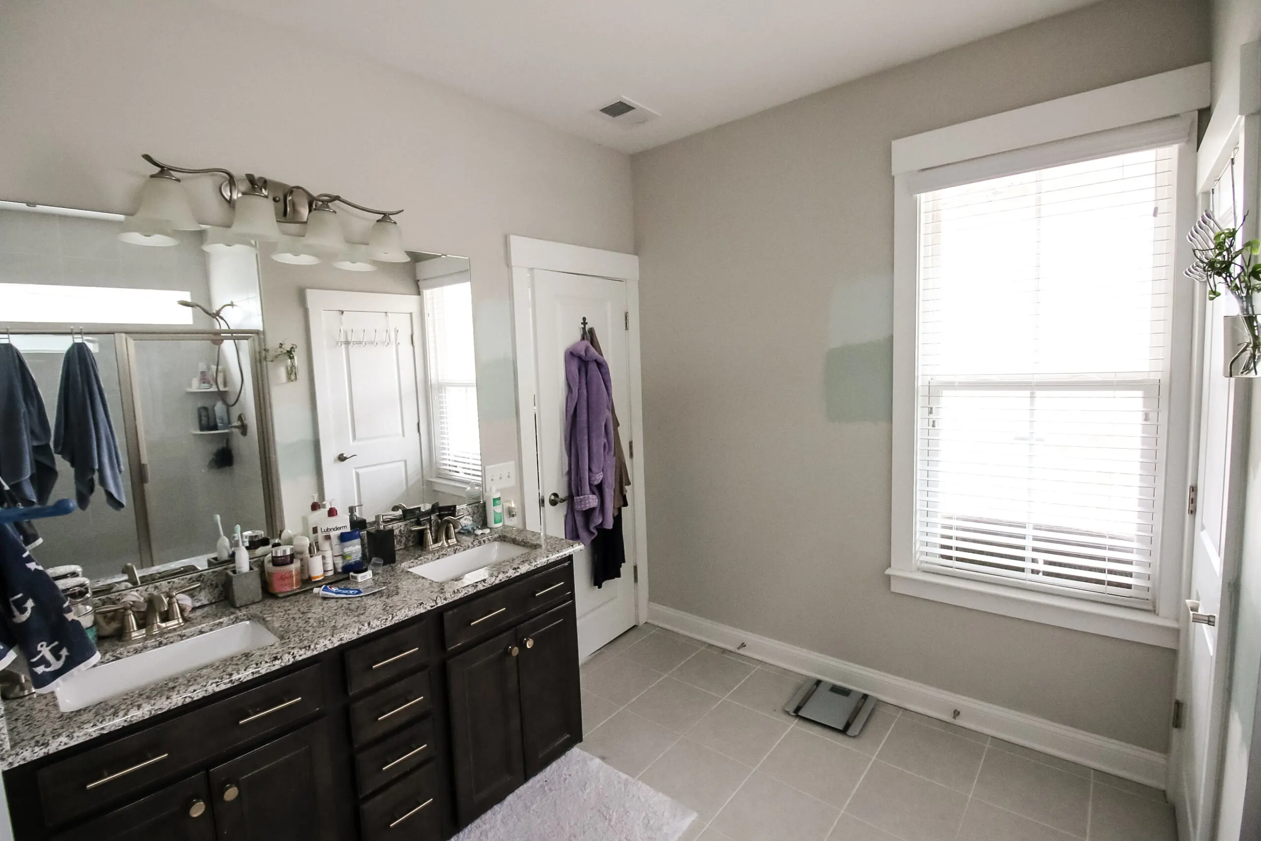 Wide angle of bathroom before