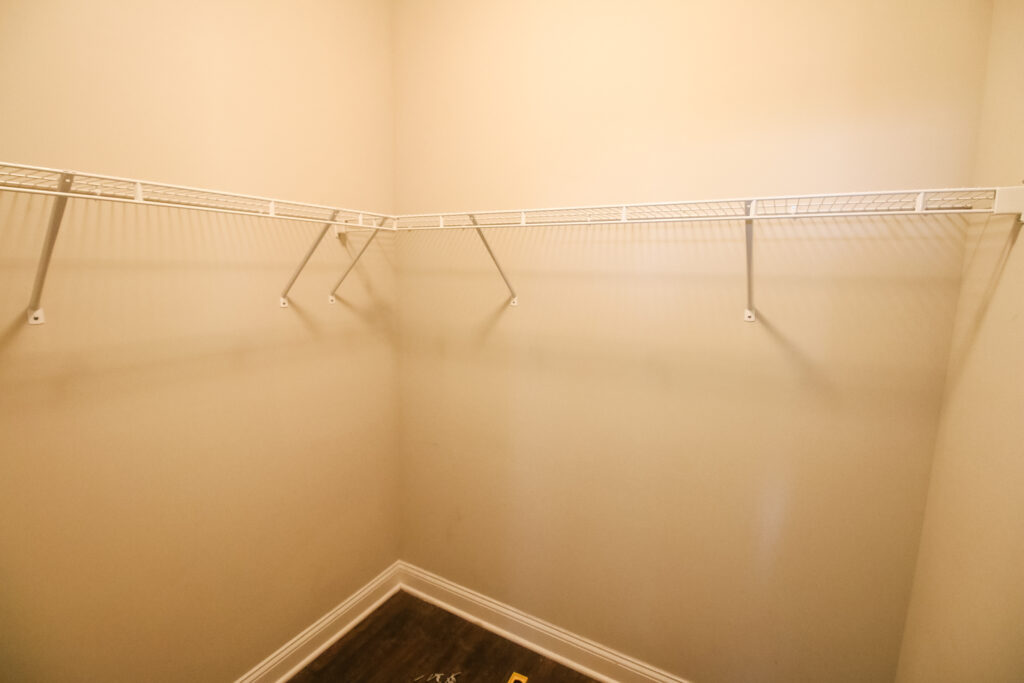 Single wire shelf in walk in closet