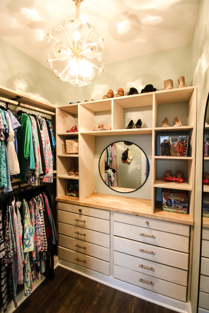 Final photo of built in dresser in walk in closet