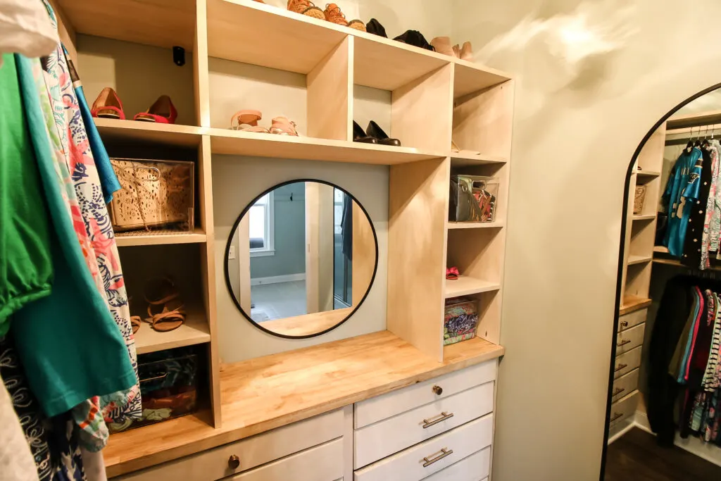 Walk in closet with mirrors
