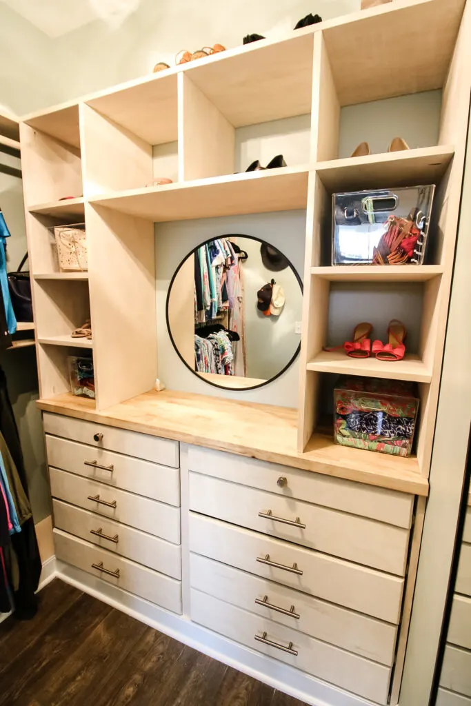 Vertical image of DIY built in dresser with cubbies