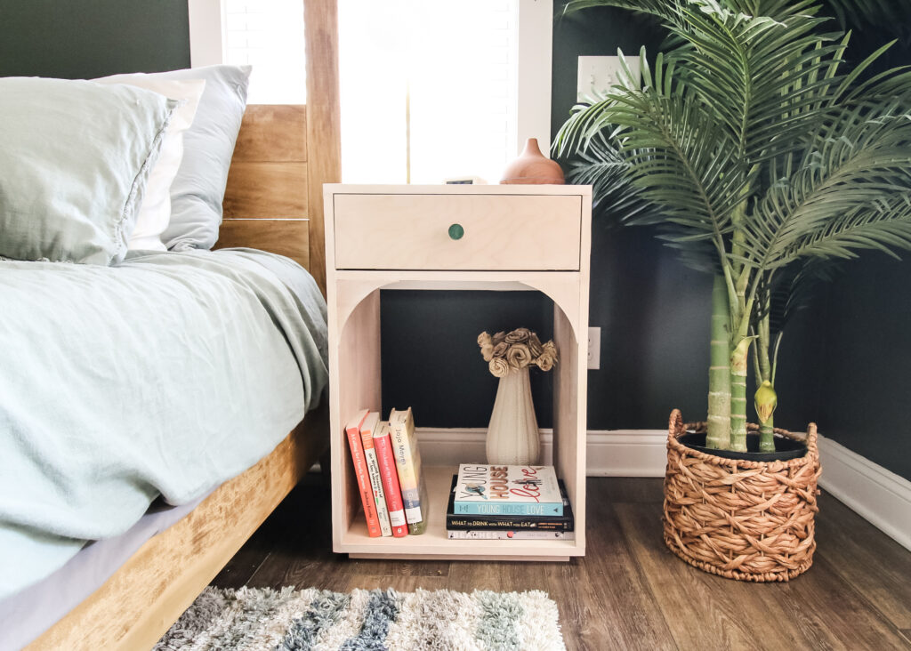 Front view of DIY modern bedside table with arches