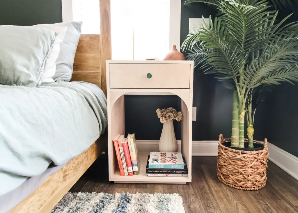 Front view of DIY modern bedside table with arches