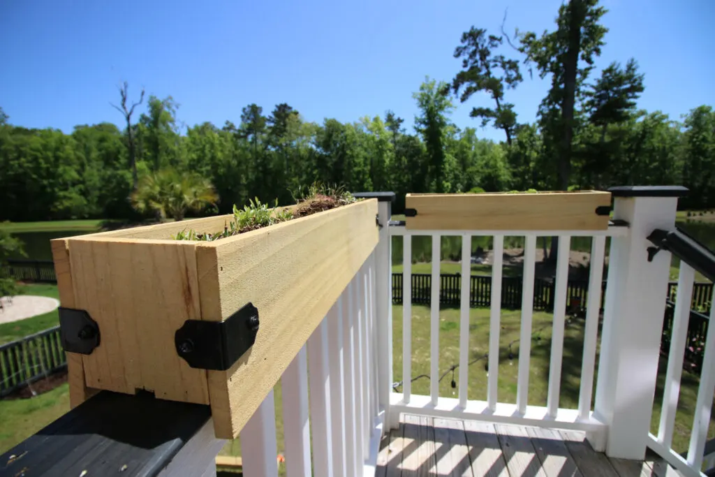 Finished DIY deck rail planters