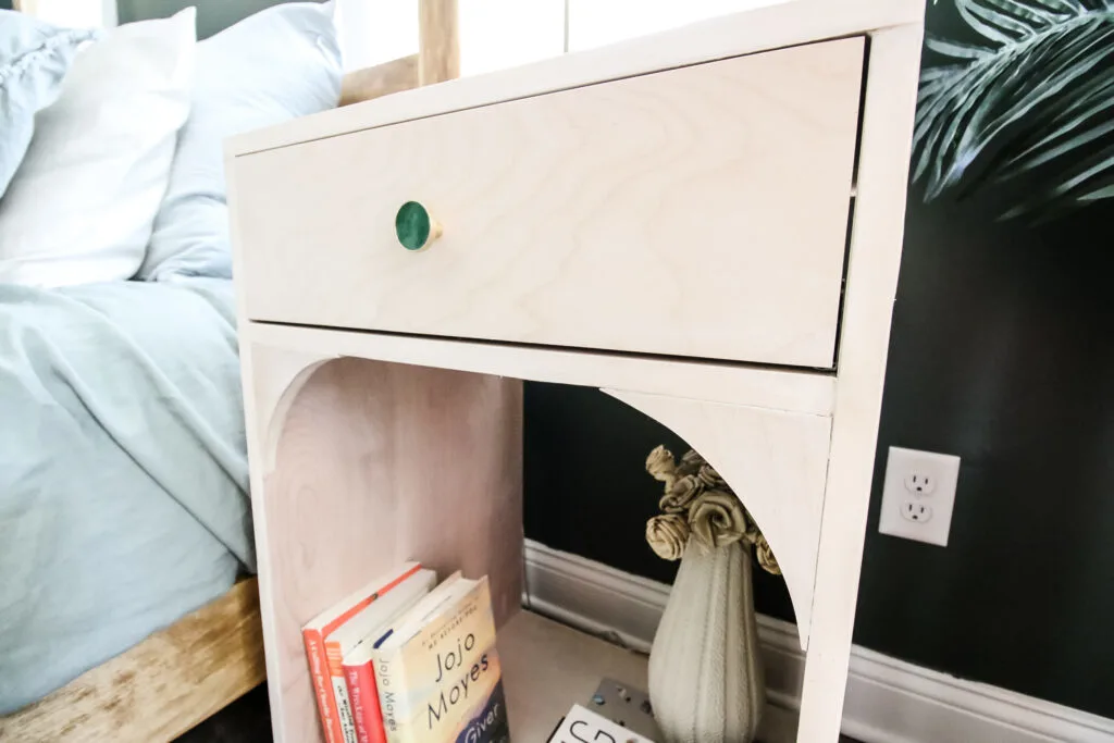 Close up of arches and drawer on DIY bedside table