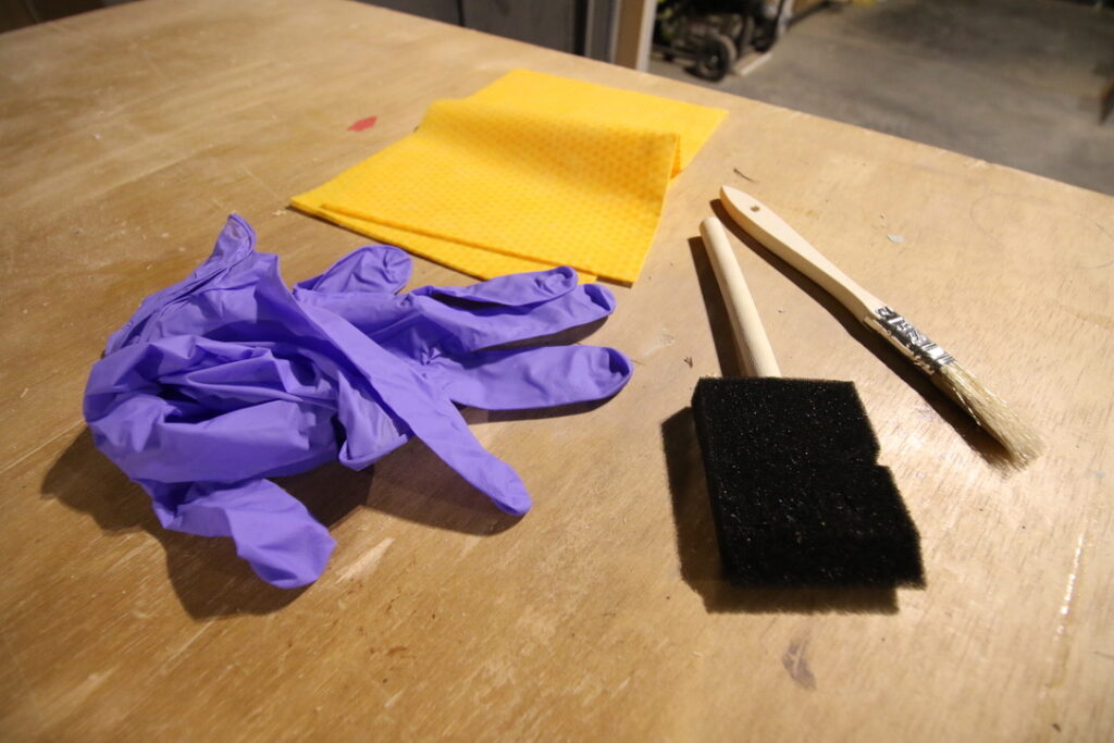 supplies needed to stain wood: gloves, lint free cloth, foam brush, or paint brush