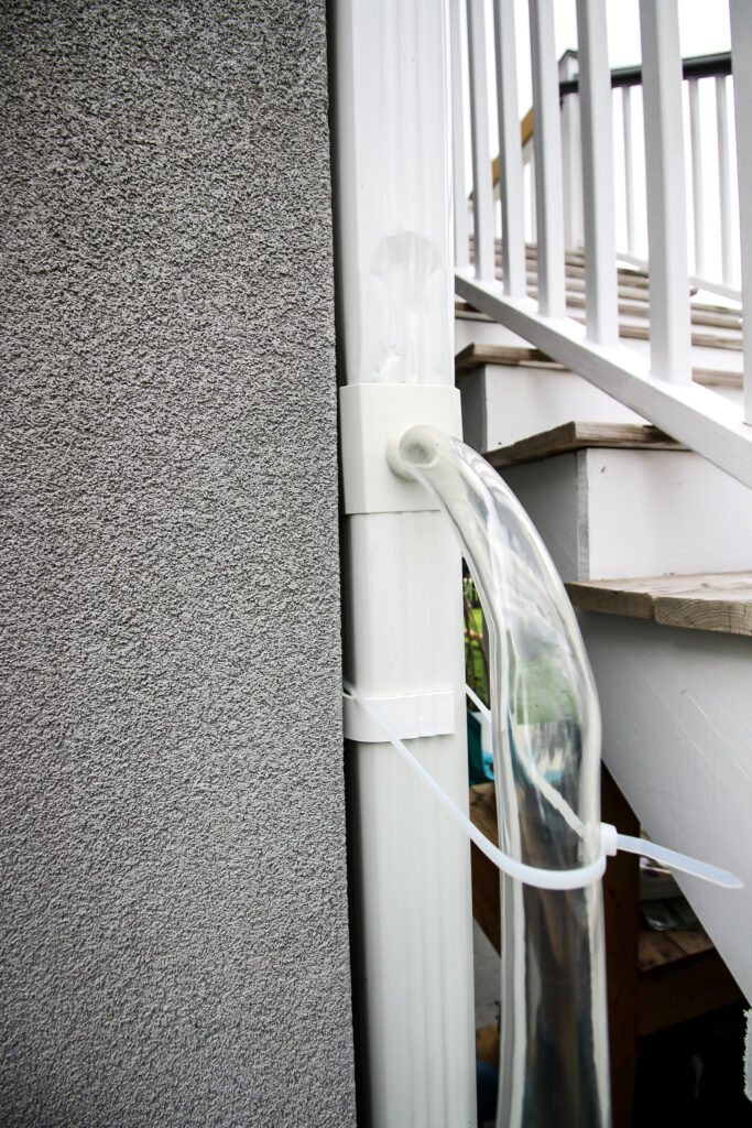 rain barrel water collection system on downspout