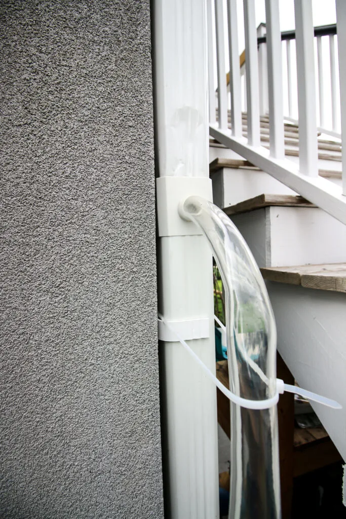 rain barrel water collection system on downspout