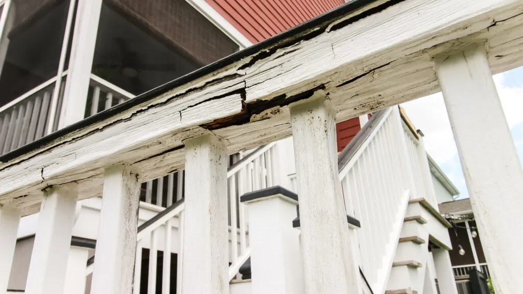 Rotted wood on railing