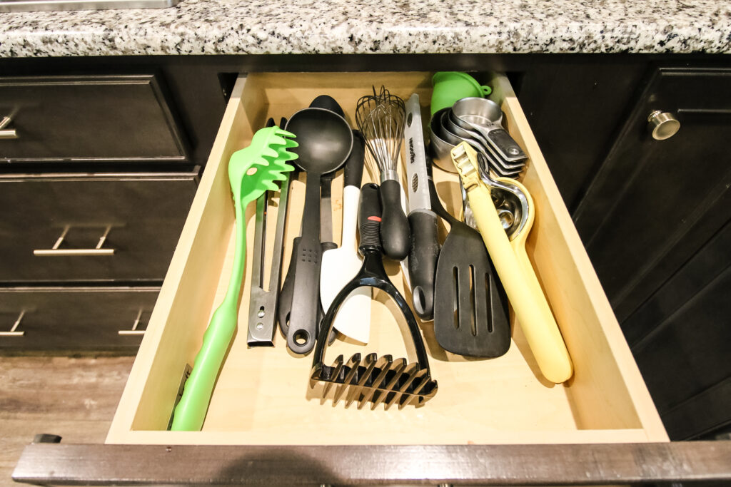 Kitchen drawer mess before organization