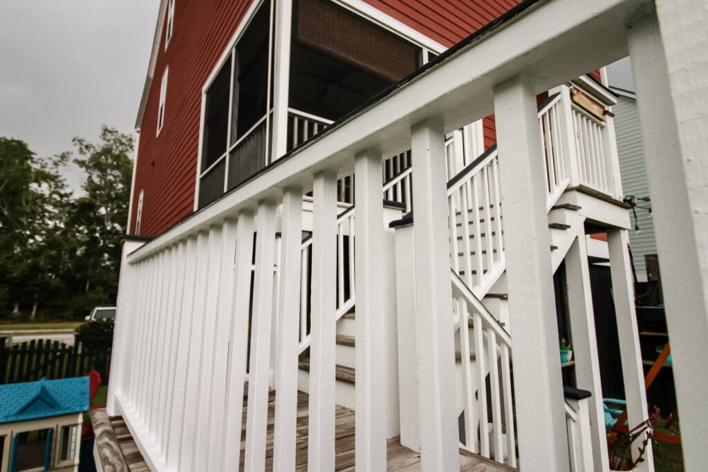 Look at underside of railing spindles