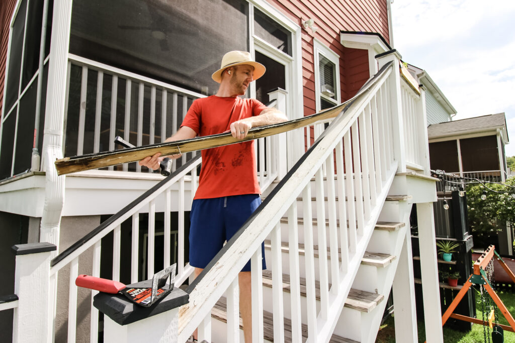 Using trim puller to remove old railing cap