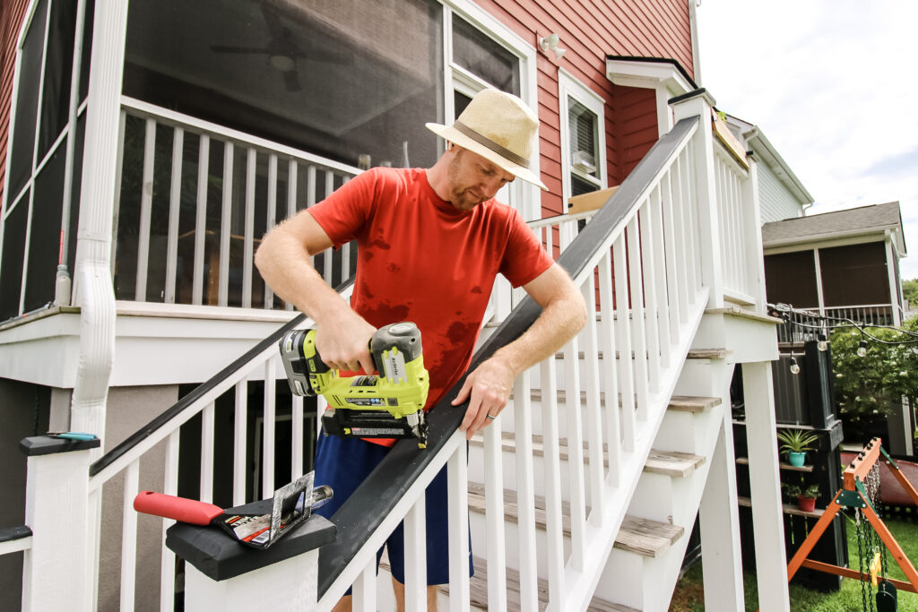 Nailing new railing cap into place